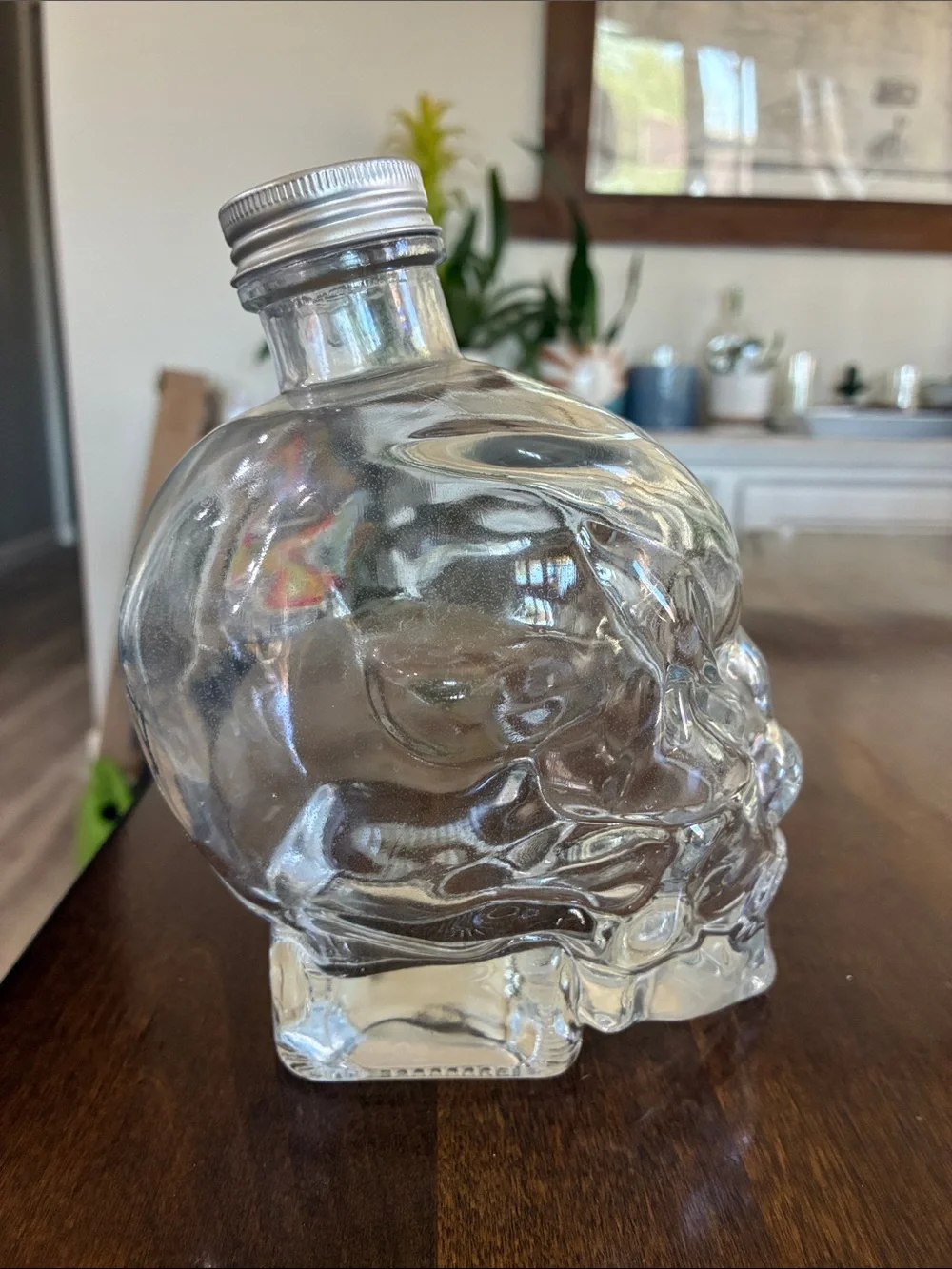 Clear Glass Skull Bottle with Silver Cap